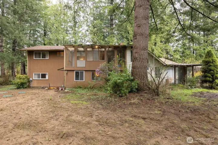 Looking at the rear elevation of the home with the brand new 3-bedroom septic that Jake Breakey recently installed.