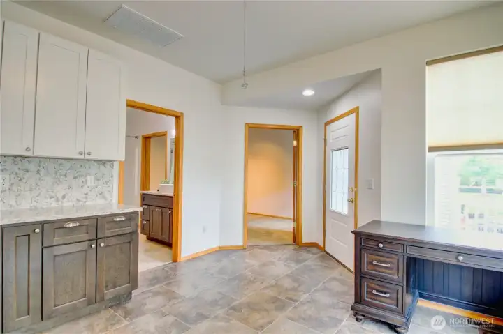 Inviting entry opens to dining room and offers access to second bedroom and second bathroom.