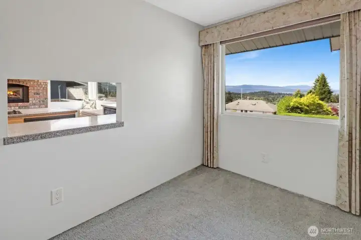 Dining room with view into kitchen. Dining room with view into kitchen.