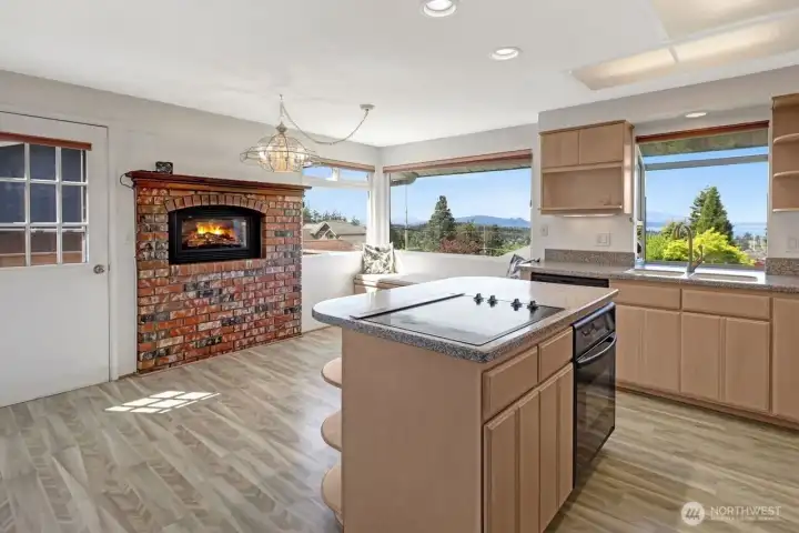 Gas fireplace in kitchen/eating ara. Gas fireplace in kitchen/eating ara.