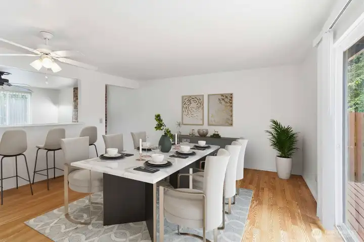 Virtually staged - dining room with a nice yard view