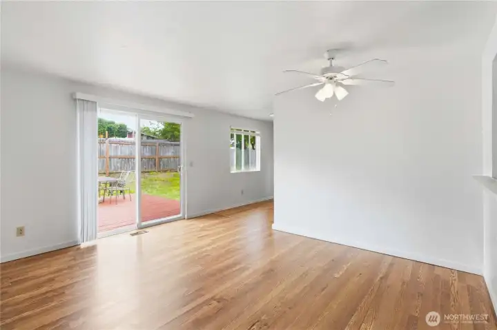 A bright dining room with a nice yard view