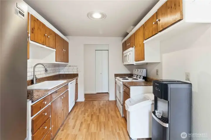 Kitchen with classic cabinetry and granite countertops