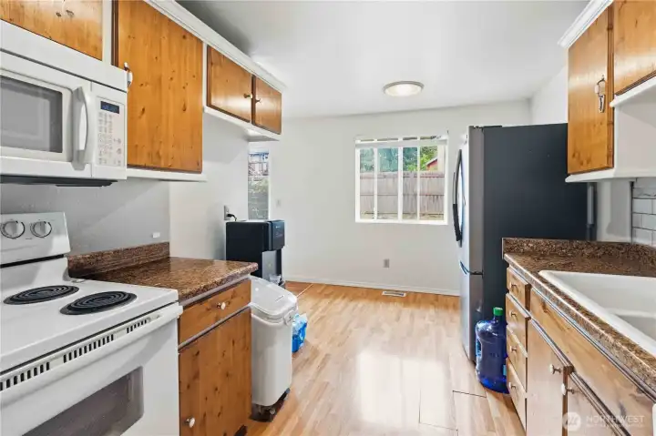 Kitchen with classic cabinetry and granite countertops