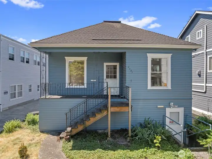 Top floor 3 beds, 1 bath, Bottom floor opportunity to put bedrooms back in