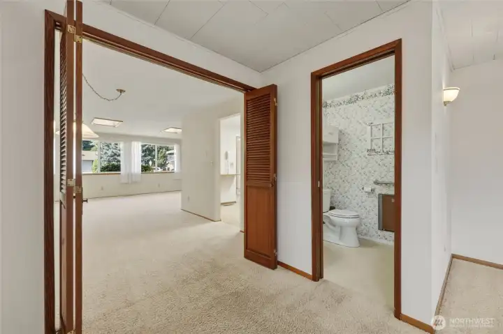 Convenient half bath located adjacent to the family room.