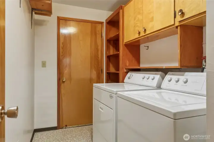 Dedicated utility room with washer and dryer included.
