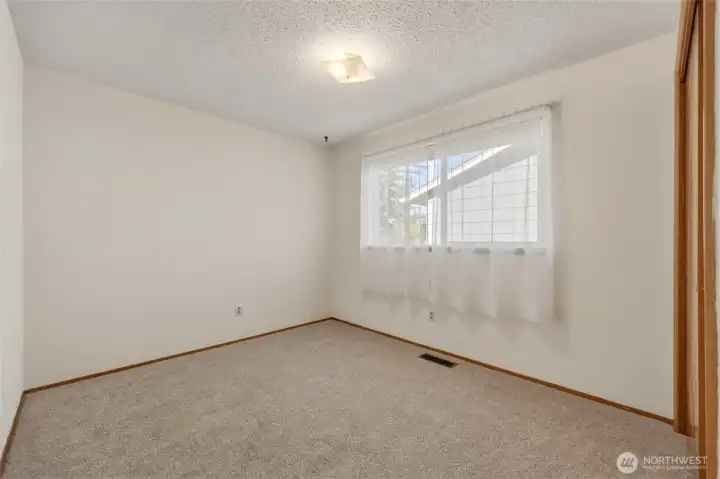 Bright secondary bedroom with new carpets