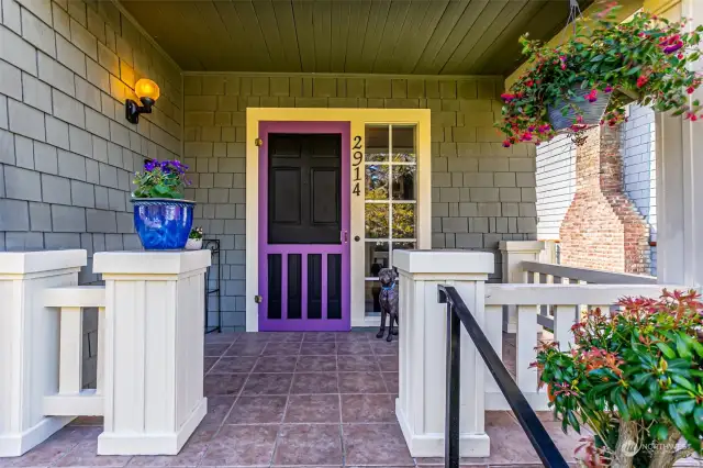 Inviting front porch with plenty of space for plants and some outdoor seating.