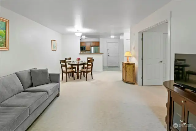 Bedroom to the right, bath/laundry on the right beyond.