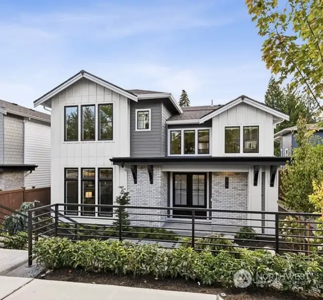 Lovely new home located minutes from Downtown Kirkland, and a few blocks from Heritage Park & Lake Washington.  Ten-foot ceilings on the main level showcase an airy & open layout in addition to spacious bedrooms each with en- suite baths.