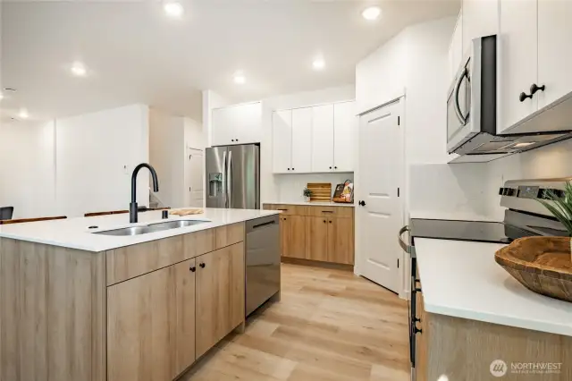 Photos shown are of a similar floor plan previously built in a different neighborhood (The Ridge in Blaine). Finishes and features may vary. Some items pictured reflect buyer-selected upgrades which are not included in the base price and may be added at an additional cost.