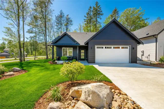 Photos shown are of a similar floor plan previously built in a different neighborhood (The Ridge in Blaine). Finishes and features may vary. Some items pictured reflect buyer-selected upgrades which are not included in the base price and may be added at an additional cost.