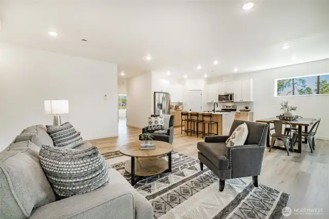 Photos shown are of a similar floor plan previously built in a different neighborhood (The Ridge in Blaine). Finishes and features may vary. Some items pictured reflect buyer-selected upgrades which are not included in the base price and may be added at an additional cost.