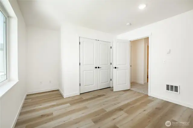Photos shown are of a similar floor plan previously built in a different neighborhood (The Ridge in Blaine). Finishes and features may vary. Some items pictured reflect buyer-selected upgrades which are not included in the base price and may be added at an additional cost.