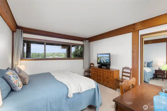 Water views from the large primary bedroom.