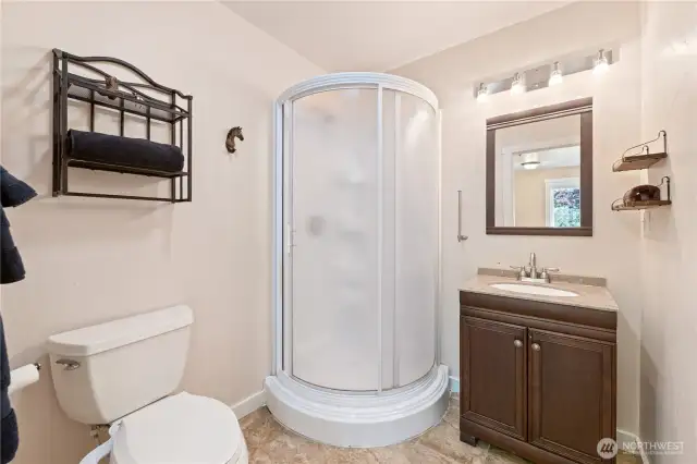 Bath in studio next to garage