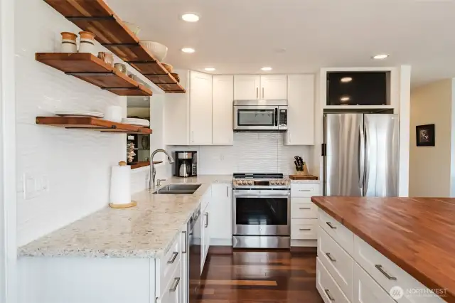 Quartz countertops and floating shelves