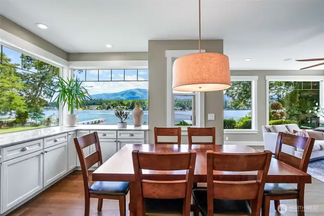 corner windows that highlight lake and mountain views