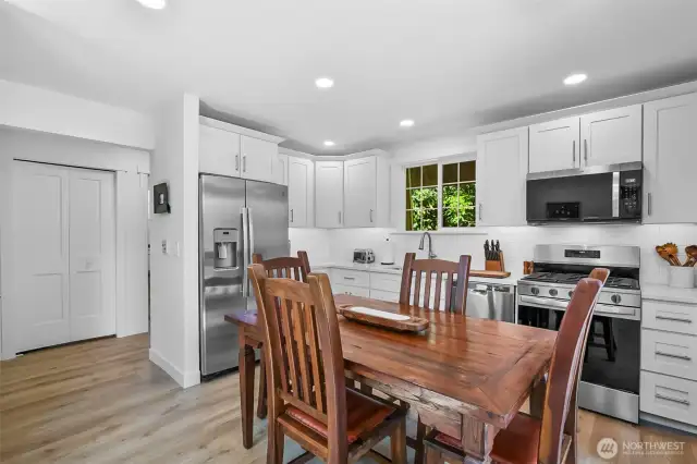 cottage kitchen, new flooring, cabinets, etc.