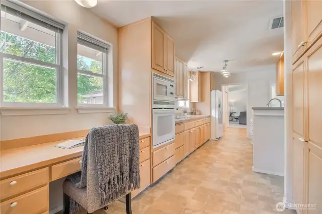 Great desk area has natural light but also offers some privacy away from the kitchen/family/eating area.