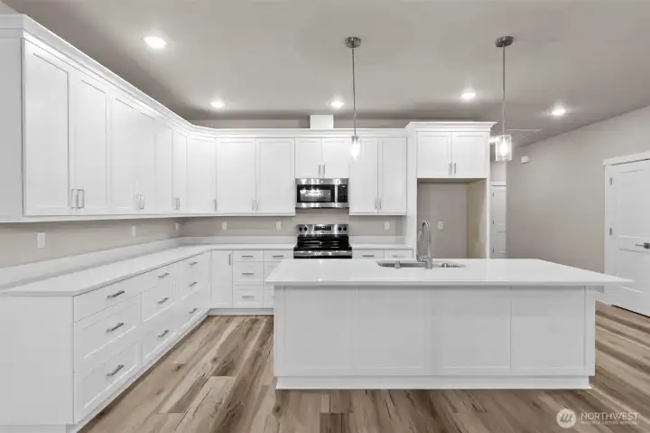 Ample storge in this abundance of locally-made custom cabinetry.