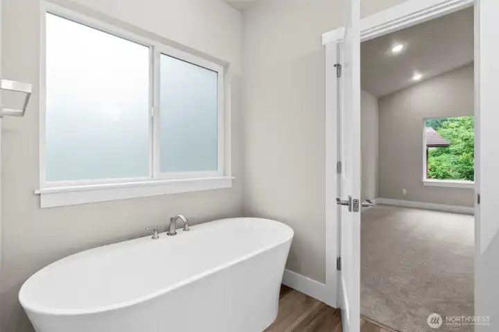 Soaking tub included in the Primary Bathroom.
