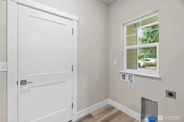 Utility/mudroom, acts as a pass through to the garage, keeping your whole home clean!