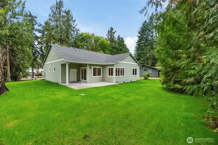 Another shot showcasing the size of this property and lawn!