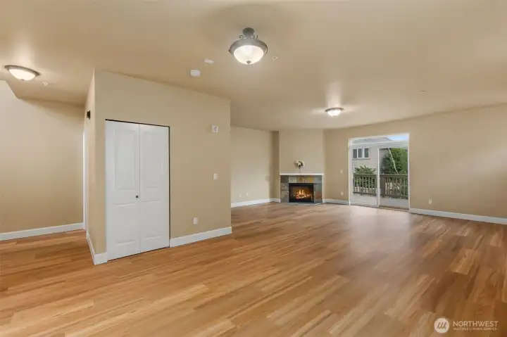 Great room with gas log fireplace.