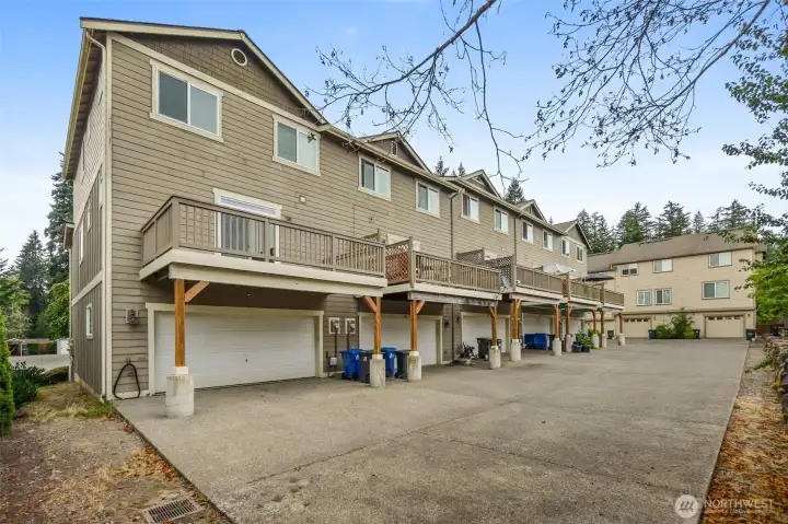 Easy rear entry to the garages.  Perfect place to keep the garbage cans out of sight.