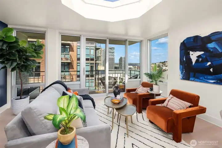 Newer floor-to-ceiling windows and sliding door to balcony