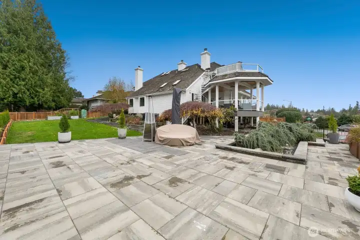 Not pictured: Another large tiled BBQ terrace by the basement entrance with custom built-in flower garden. And a third tiled terrace along the house by the side-door garage entry.