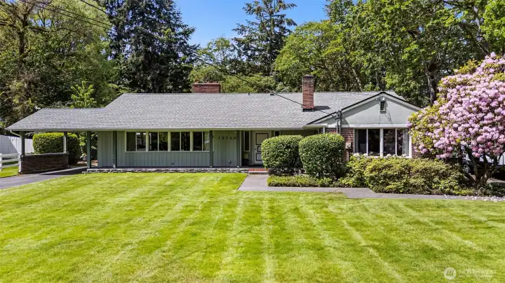 Welcome Home! Behind the classic rambler façade lies a staggering 4500sqft of living space!