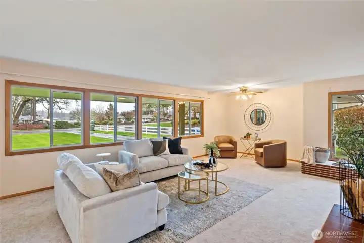 View of the expansive front lawn and peek-a-book view of American Lake.