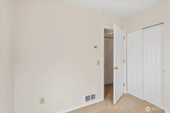 2nd bed view of closet