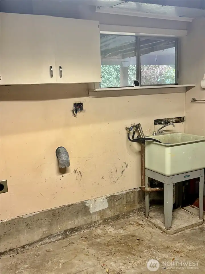 Laundry spot in the lower level.