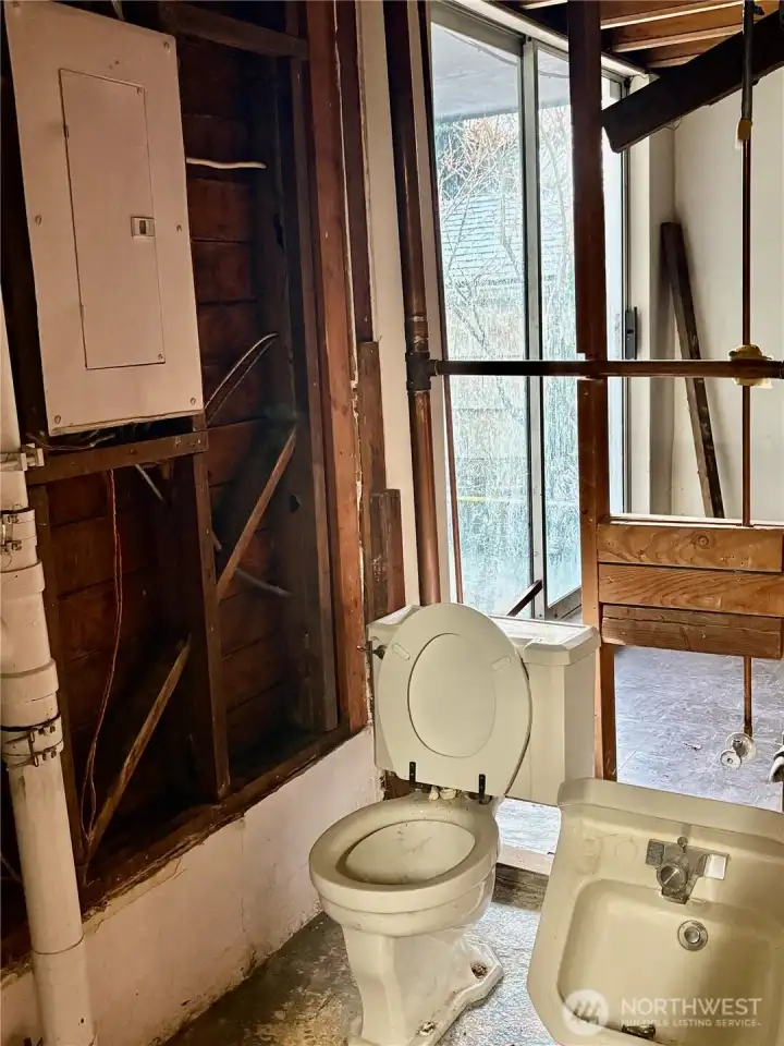 1/2 bath ready for re-do; lower level.