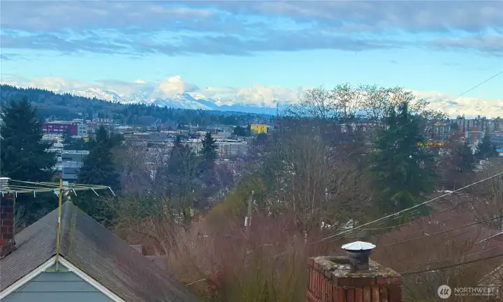 Looking West to the Olympics, from the primary bedroom (Upper level).