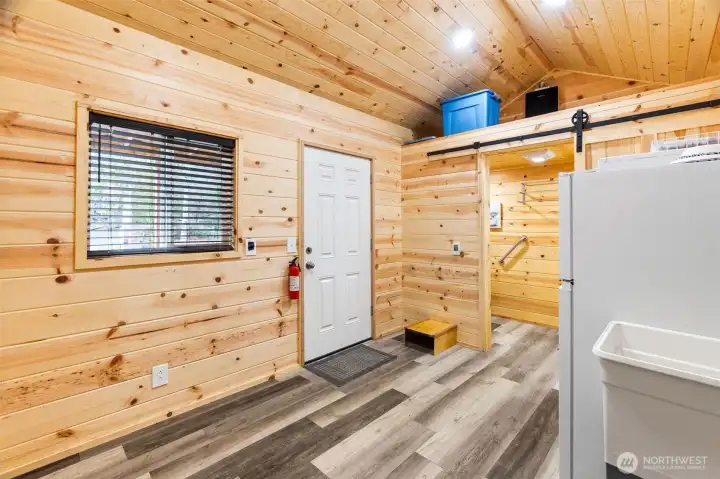 Finished outbuilding with water, power, 3/4 bath and laundry