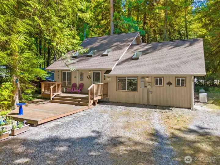 Welcome home to your year-round cabin in the gated Snowline Community.