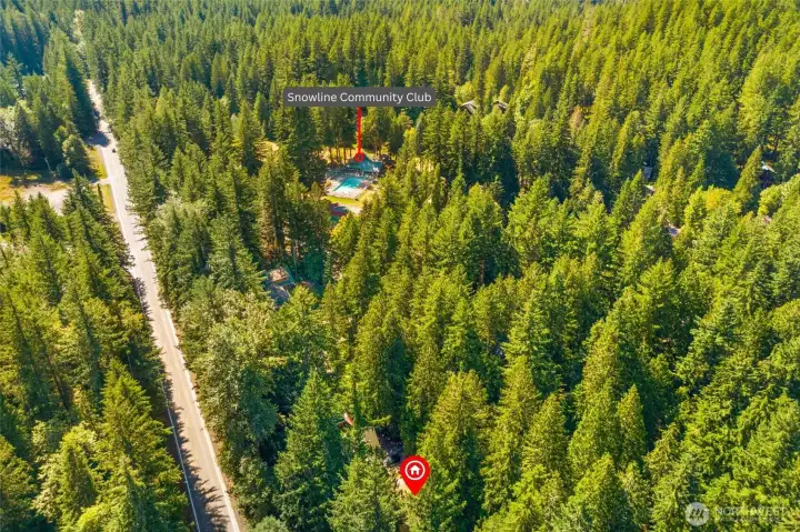 Aerial view highlighting proximity to Snowline Community Club amenities.