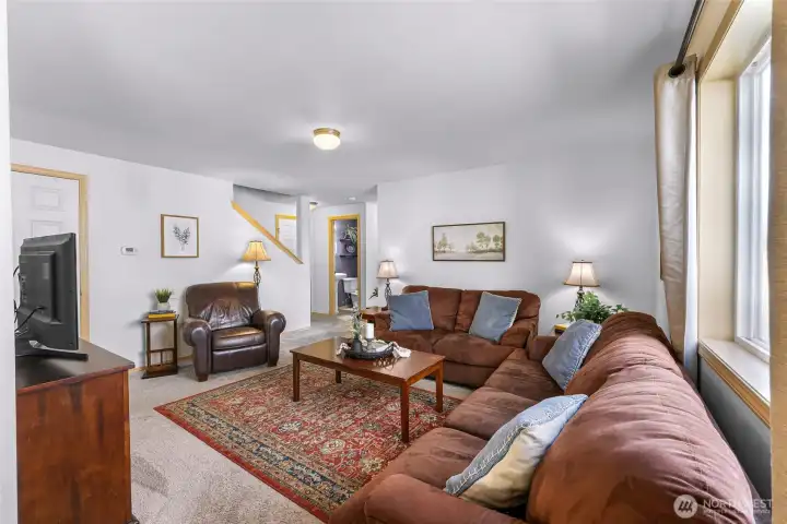 Picture windows keep the living room bright year round