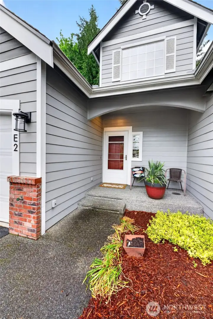 Enjoy the HOA landscaping whle you enjoy a moment to relax on your south facing front porch.