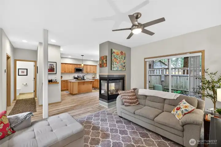 The open floor plan makes for easy entertaining as it flows easily into the kitchen or out to your patio.