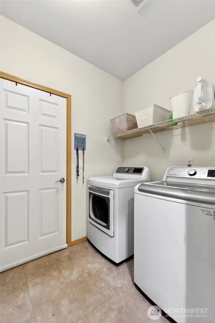 The laundry is on the main floor with direct access to your 2 car garage.  Inclusion of the W/D are negotiable