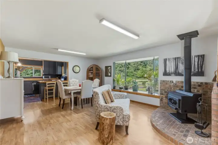Family room with fireplace and dinning in the back