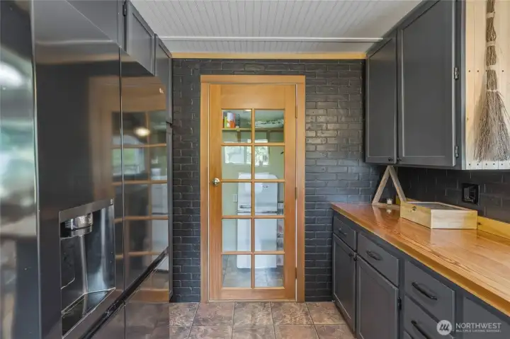 Kitchen pantry door straight ahead