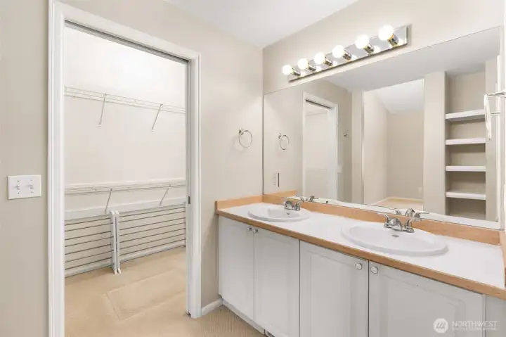 Primary bath area connecting to walk in closet