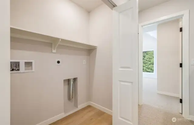 3rd floor laundry w/ side-by-side connections. All pictures are of a completed home of same plan. Finishes will vary